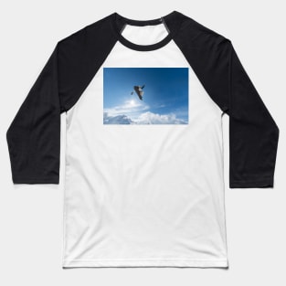 Snowboarder jumping against blue sky Baseball T-Shirt